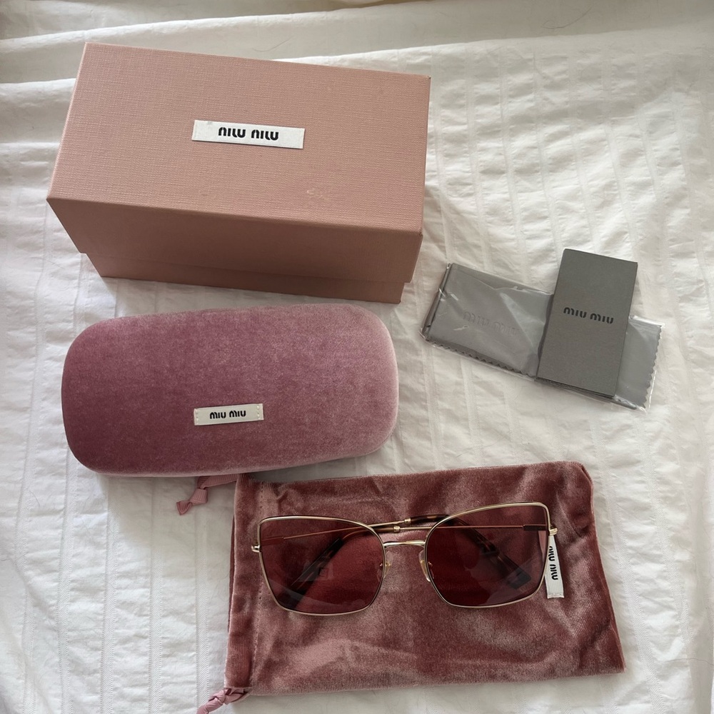 Miu Miu rose coloured sunglasses